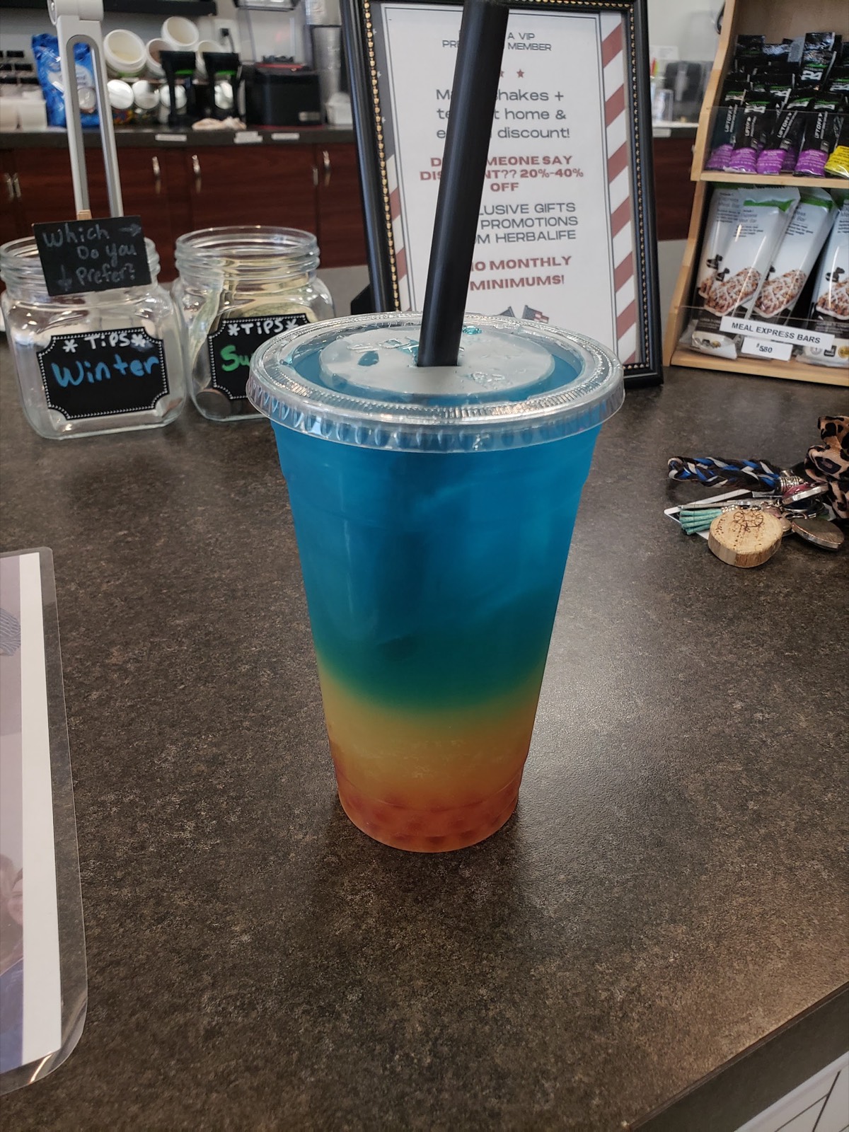 Rainbow layered bubble tea on the counter